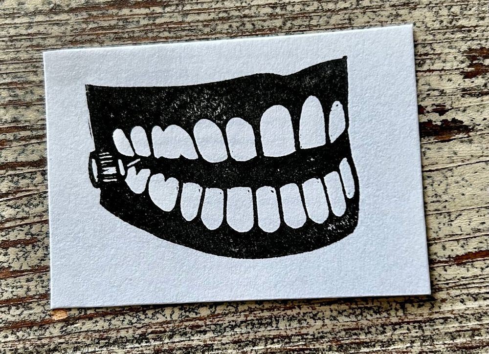 wind up chattering teeth hand carved rubber stamp